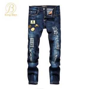 OEM ODM Оптовые дизайнеры Синие джинсы Мужские рваные узкие эластичные джинсовые брюки Тонкие мужские джинсы Новый модный стиль Уличная одежда